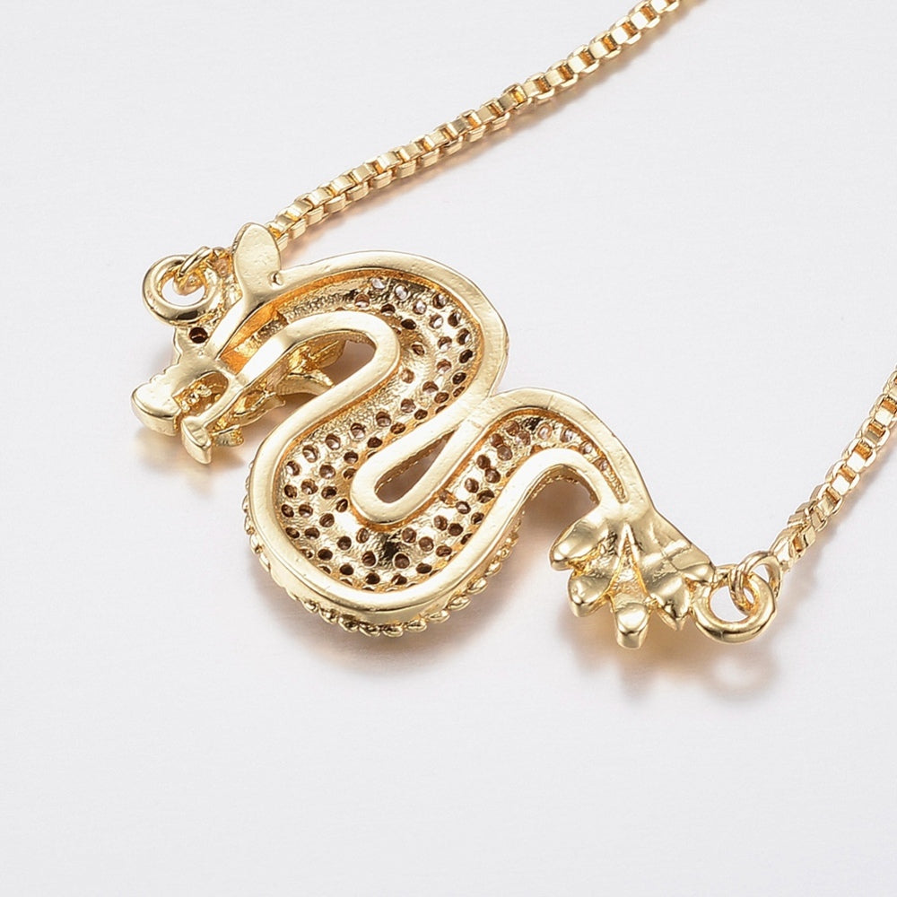 Bracciale dorato Drago con zirconi - Regolabile