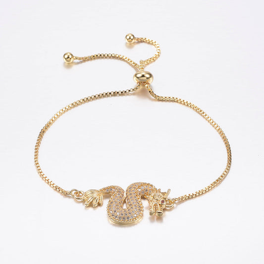 Bracciale dorato Drago con zirconi - Regolabile